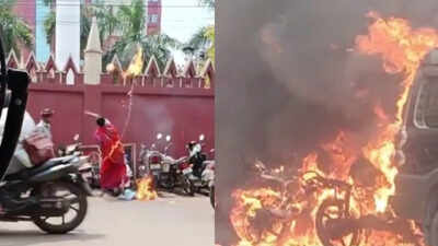 a woman has been detained after setting fire to petrol bottles near the orissa high court boundary wall in cuttack