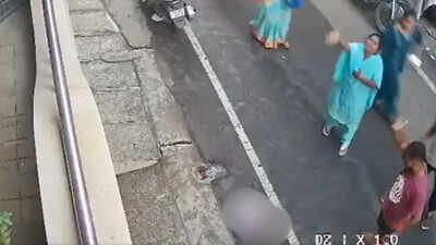 the toddler was playing inside the house when she wandered out through the main door into the passage