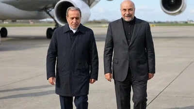 iran39s foreign minister abbas araghchi left and parliament speaker mohammad bagher ghalibaf
