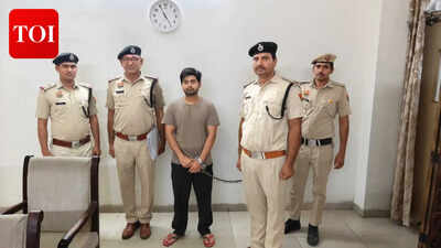 23 year old aman has been taken into custody after he allegedly used a brick and spade to fatally attack his older brother