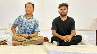 before launching the fast wangchuk accompanied by cockroach janata party cjp founder abhijeet dipke visited rajghat to pay tributes to mahatma gandhi